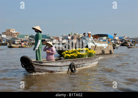 Flower sellers Cai Rang Floating Market Mekong Delta Vietnam Stock Photo