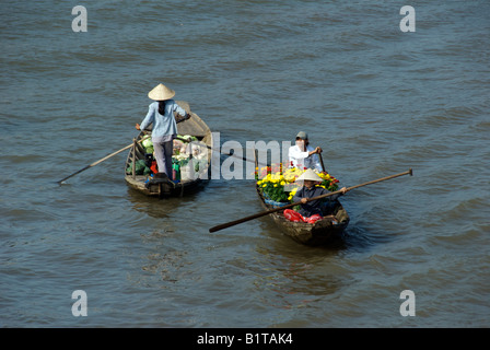 Flower and vegetable sellers Cai Rang Floating Market Mekong Delta Vietnam Stock Photo