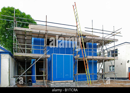 a new timber framed house under construction in england,uk Stock Photo