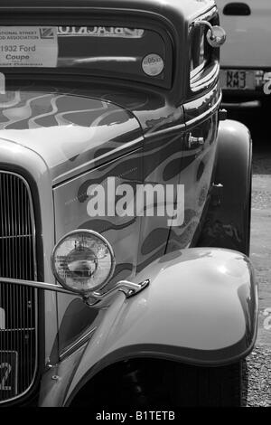 1934, ford,hot rod, custom car, 34 coupe, modified car, flames, chrome, peep mirror, lush, paint, paint job, gleaming, b+w Stock Photo