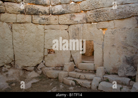 Inside the prehistoric temple of Mnajdra, Malta, Europe. Stone age history. Stock Photo