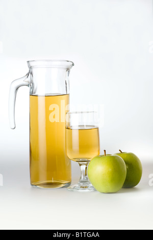 apple juice with two green apples isolated Stock Photo
