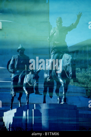 Reflection on the water. Statue of Don Quijote and Sancho Panza. Plaza de España. Madrid. Spain. Stock Photo