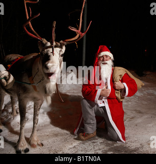 Santa Claus and Reindeer, Jukkasjarvi,  Kiruna, Sweden Stock Photo