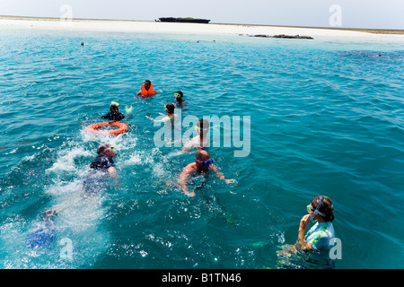 Group of people snorkeling Snorkeling and Diving Trip Kisite Mpunguti Marine National Park Coast Kenya Stock Photo