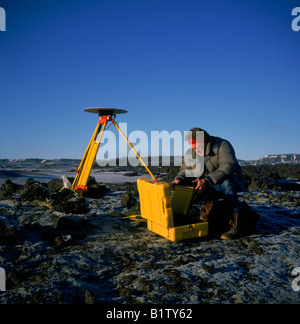 Scientist with GPS Equipment Measuring Earth Movements in Iceland Stock Photo