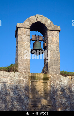 bell hanging above the archway to the garrison st marys Isles of Scilly Stock Photo