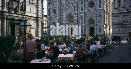 ITALY Tuscany Florence People sitting at restaurant tables in front of the Duomo cathedral church Stock Photo