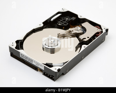TECHNOLOGY IT Computers Open computer hard drive showing disc and read write mechanism Stock Photo