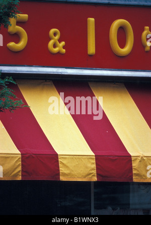 Colorful awning over old fashioned five & dime store Stock Photo