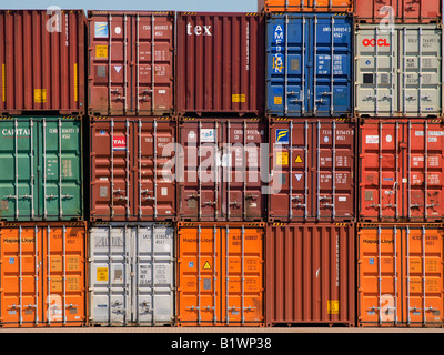 Various shipping containers stacked Antwerp port Belgium Stock Photo