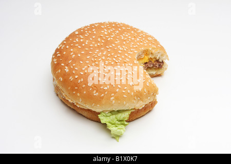 Hamburger isolated on white one bite taken out of it Stock Photo