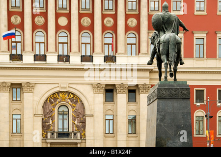 Statue (1954) of Prince Yuri Dolgorukiy, founder of Moscow.  Behind is the Moscow Mayor's office, Tverskaya Square, Moscow Stock Photo