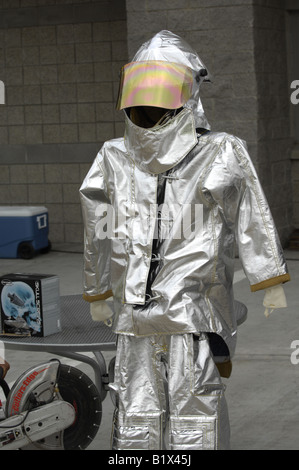 Silver fire rescue protection suit safety equipment asbestos Stock Photo