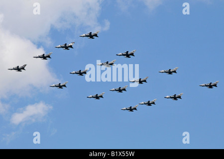 Formation of 16 sixteen RAF Panavia Tornado GR4 combat jet aircraft flying over rural Essex on way to London flypast England UK Stock Photo