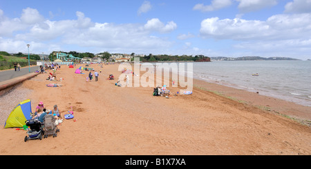 Panoramic image of holidaymakers enjoying the sandy beach at Goodrington South near Paignton in Devon Stock Photo