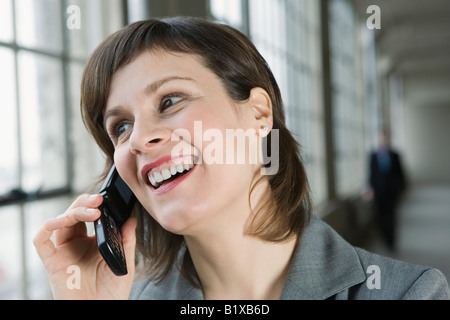 Close-up of a businesswoman talking on a mobile phone Stock Photo