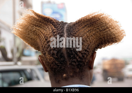 Close up of young black man (back side) with  blonded hair. Maputo, Mozambique. Stock Photo