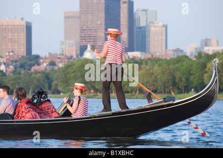 Tourists traveling in a gondola Stock Photo