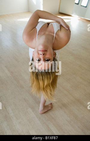 Mid adult woman dancing Stock Photo
