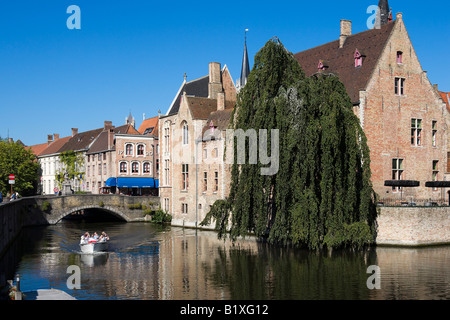 Boat trip on a canal in the old town, Bruges, Belgium Stock Photo