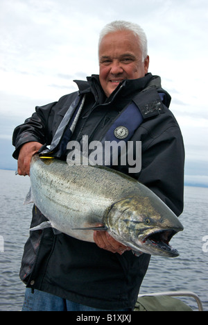 Big male King (Chinook) salmon from Alaska isolated on white. He is in a  stage of color known as blush. This one weighed 66 pounds and measured 51  inc Stock Photo - Alamy
