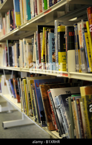 Library books on shelves Stock Photo - Alamy