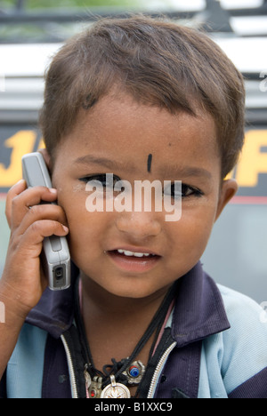 Rajasthani boy talking through a mobile phone, Rajasthan (India) Stock Photo