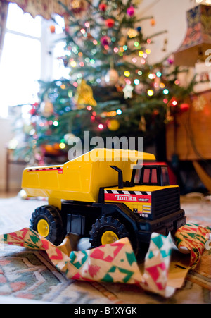 Child's toy truck at Christmas Stock Photo