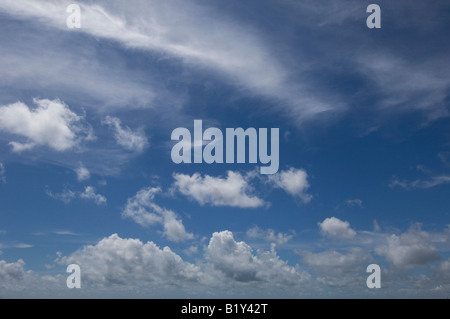 Cirrus and cumulus clouds in blue sky over Sussex UK Stock Photo