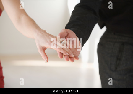 Mid section view of a couple dancing Stock Photo