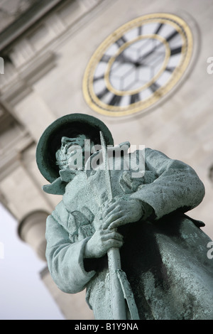 Town of Barnsley, England. Angled close up view of Barnsley war memorial, cenotaph, with Barnsley Town Hall in the background. Stock Photo