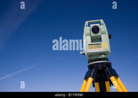 Land Surveying Under Blue Sky Stock Photo