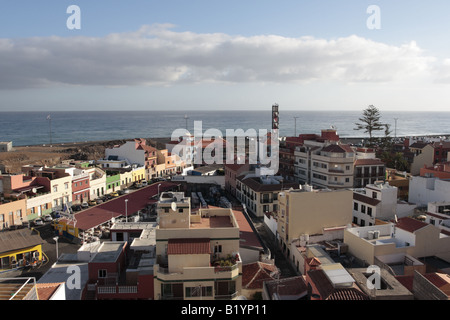 Looking north across the rooftops of Puerto de la Cruz to the Atlantic ocean early morning Tenerife Canary Islands Spain Stock Photo