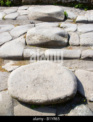 Stepping stones and ruts from carts on Pompeii s roads Pompeii Campania Italy Stock Photo