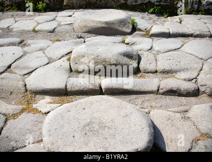 Stepping stones and ruts from carts on Pompeii s roads Pompeii Campania Italy Stock Photo