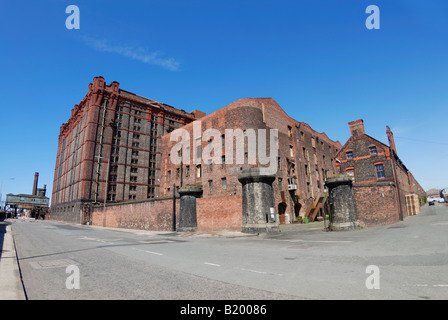 The Grade II listed buildings of the Tobacco Warehouse complex at Stanley Dock by Liverpool Docks Stock Photo