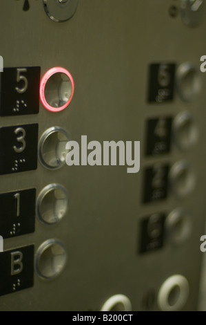 Elevator - with button for floor 5 illuminated Stock Photo