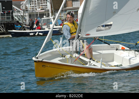 Dinghy sailing on River Thames, Hampton, Surrey, UK Stock Photo
