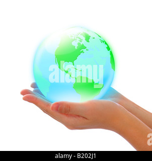 green land and blue sea crystal earth in hand Stock Photo