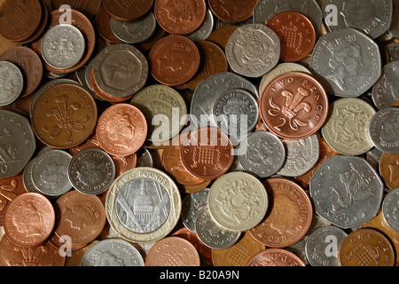 All the current UK coins in common usage are laid out, copper and silver coins, £1 & £2 coins. Stock Photo