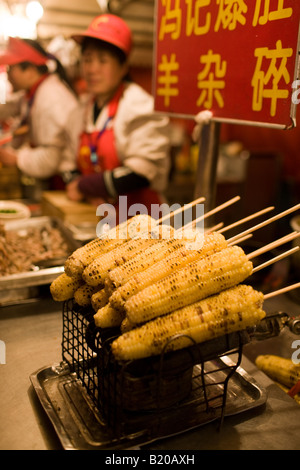 Corn on the cob for sale in the Night Market Wangfujing Street Beijing China Stock Photo