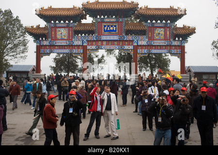 Visitors at the Cloud and Jade Archway in The Summer Palace Beijing China Stock Photo