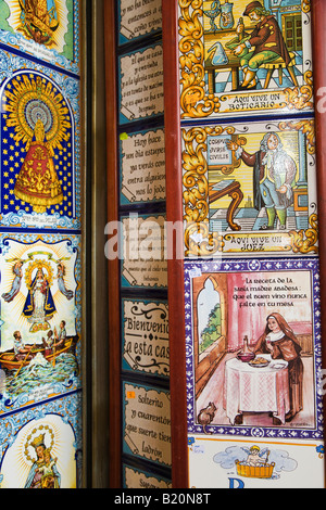 SPAIN Madrid Colorful and decorative ceramic tiles in Spanish hanging on display in souvenir shop Stock Photo
