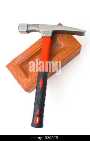 Brick hammer and brick Stock Photo