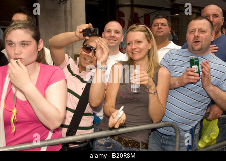 Crowds watching Gay Pride parade London UK Saturday 5th July 2008 Stock Photo