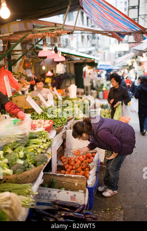 Fruit and vegetables on sale in old Chinese Soho food market in Graham Street Central Hong Kong China Stock Photo