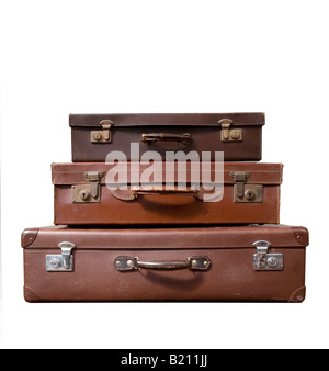 Vintage cases stacked up - shot against a white background. Stock Photo