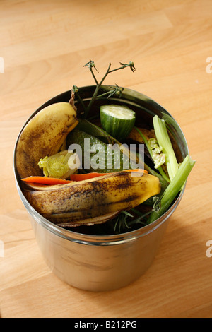 Vegetable peelings & fruit skins ( kitchen waste ) ready to be recycled for composting. Stock Photo