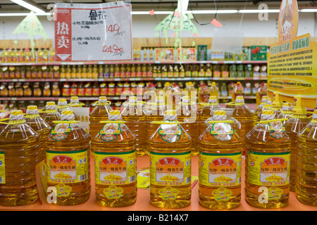 Peanut cooking oil in supermarket Chongqing China The Chinese use a lot of edible oil and find it expensive Stock Photo